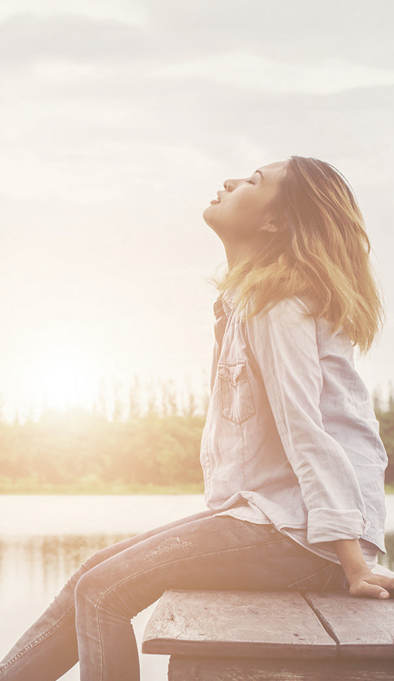 The image shows a modern dental or medical office interior with a dental chair, equipment, and a clean, professional environment.